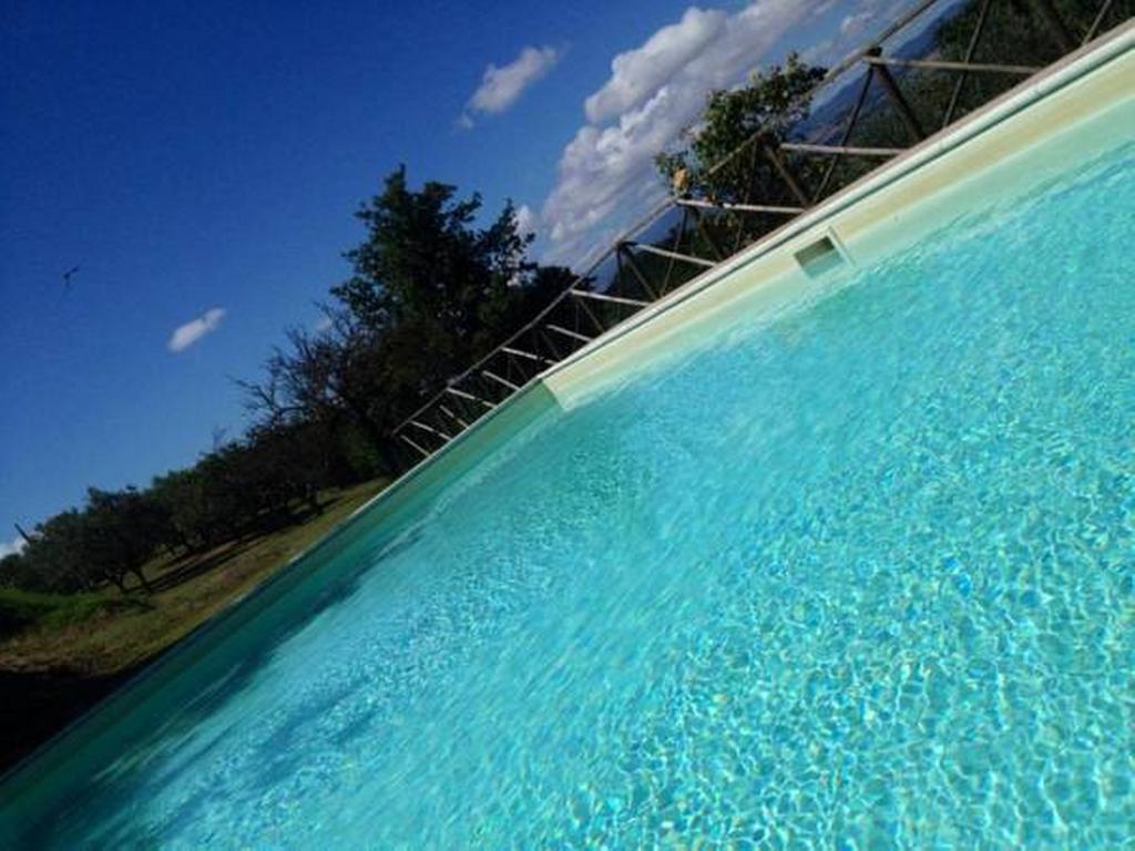 Il Poggio Delle Ginestre Guest House Torgiano Bagian luar foto