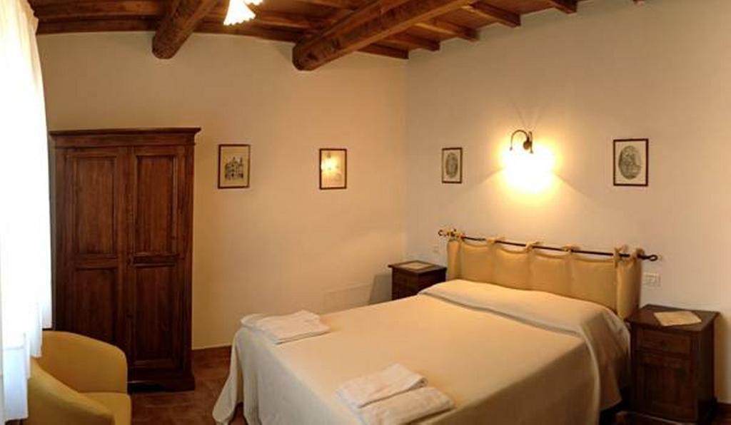 Il Poggio Delle Ginestre Guest House Torgiano Bagian luar foto