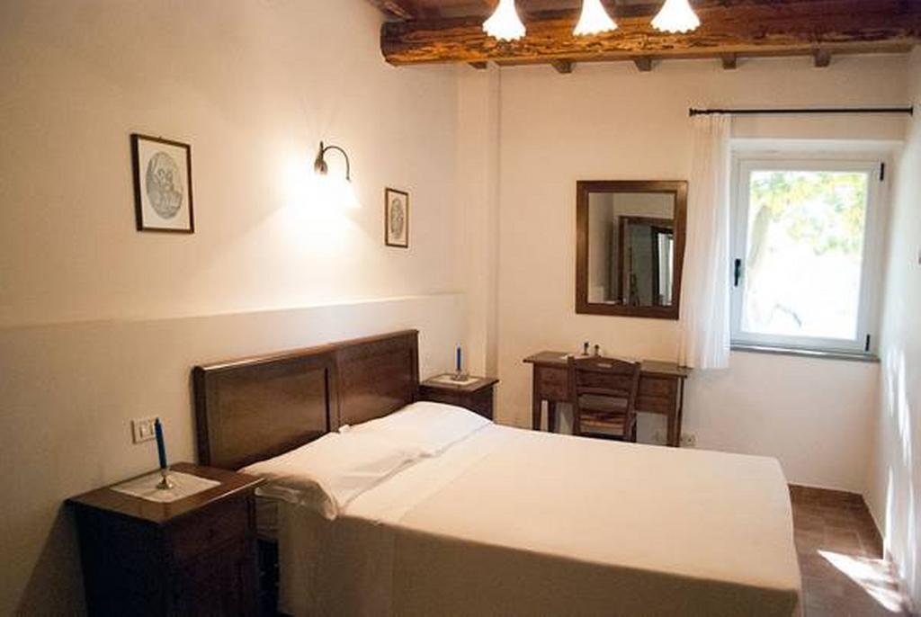 Il Poggio Delle Ginestre Guest House Torgiano Bagian luar foto